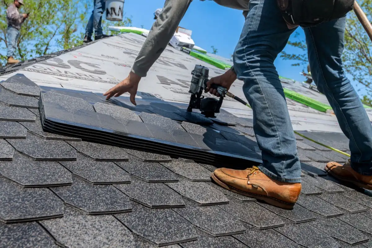 Inspecting an asphalt shingle slope after a hailstorm in Sunrise, FL